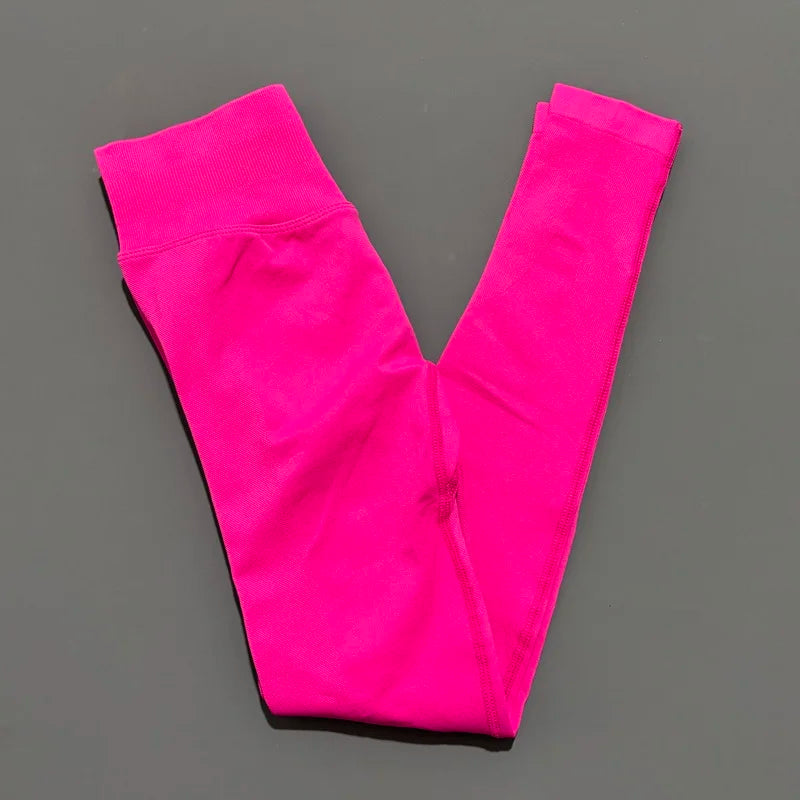 Legging sport femme sans coutures, coloris fuchsia