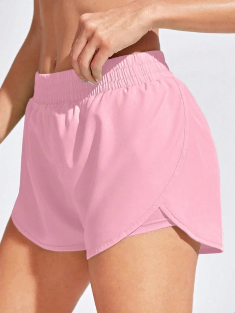 Short yoga femme élastique, coloris rose