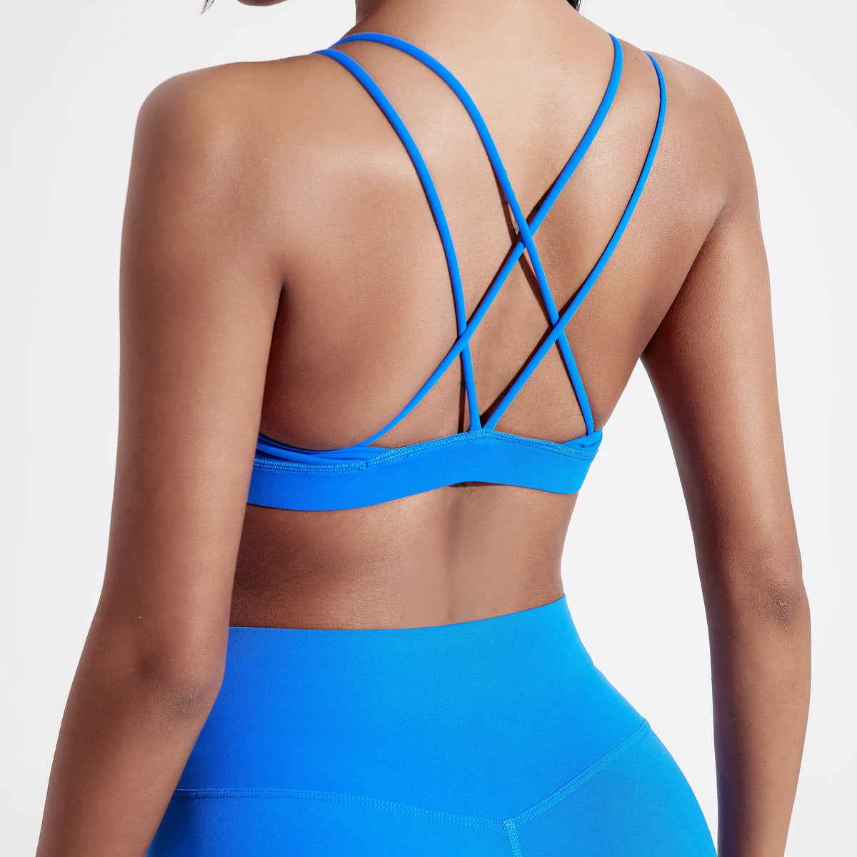Brassière sport femme croisée, coloris bleu électrique