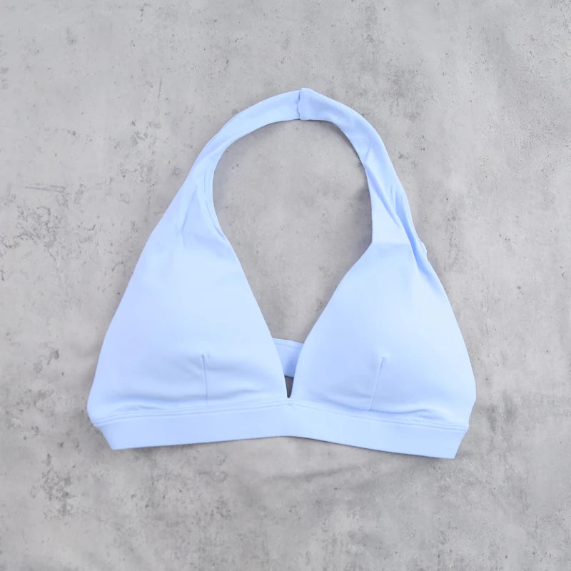 Brassière sport femme sensation seconde peau, coloris bleu clair