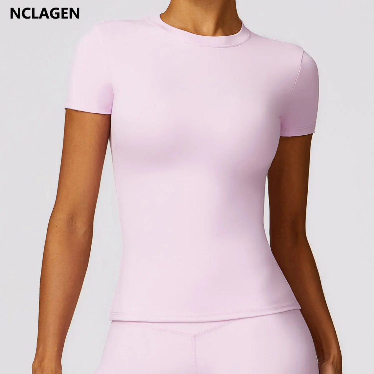 T-shirt sport femme col rond manches courtes